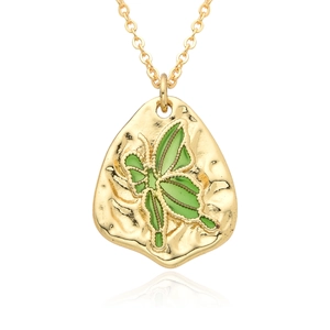 Friendship butterfly necklace with golden chain and green leaf pendant on white background