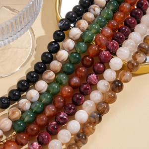 Ethnic style long sweater necklace with colorful acrylic marbled beads and vintage accents