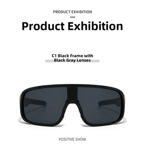 Close-up detail of the integrated large-frame cycling sunglasses with sleek black frame.