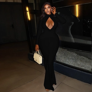 Detail of sexy black bodycon jumpsuit featuring chic teardrop cutout and flared long sleeves