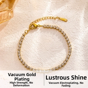 Close-up of gold-plated stainless steel tennis bracelet with lobster clasp and zircons