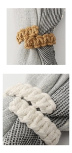 Macro shot showing woven linen texture and detailed craftsmanship of the curtain tiebacks