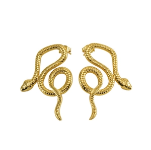 Close-up of golden snake stud earrings showing detailed metal textures and scaled body