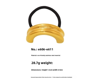 Macro view of golden geometric stainless steel hair cuff with elastic ponytail tie