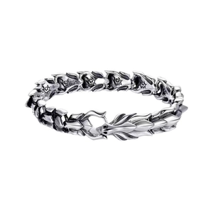 Macro shot of 925 silver dragon scale bracelet with intricate texture and secure clasp