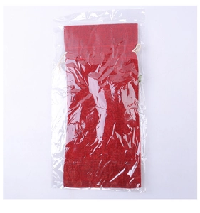 Red burlap wine bottle drawstring gift bag in clear plastic packaging detail