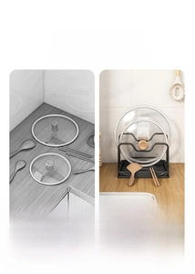 Dual-layer black metal kitchen rack organizing pot lids and spatulas with a drip tray