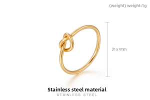 Detailed view of matte gold stainless steel knot ring with 1g weight and size specifications