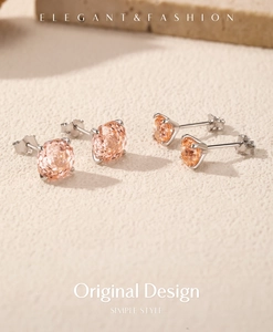 Detail of s925 silver champagne studs in two sizes with round rose cut stones
