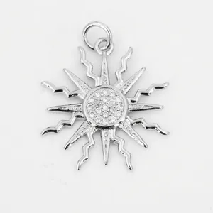 Detail of silver sunflower pendant with micro-paved cubic zirconia and ray texture