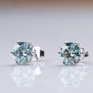 Classic six-prong S925 silver stud earrings with round light blue moissanite stones