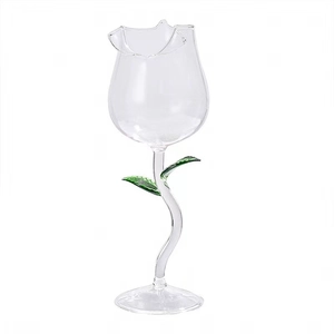 Elegant rose-shaped clear wine glass with curved green stem and leaf details