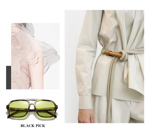 Detail der Tortoise-Pilotensonnenbrille mit gelben Gläsern und modischem Model-Outfit