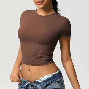 Detail view of coffee brown short sleeve crop top with high elastic slim fit fabric