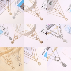 Set de collares geométricos con colgantes de mariposa y corazón en oro y plata