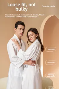 Breathable white striped bathrobe for couples featuring soft absorbent fabric and waist tie