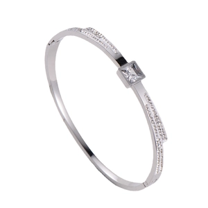Silver titanium steel bangle with a square clear stone and pavé rhinestones