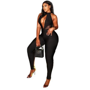 Slim fit black cutout jumpsuit with halter neck design and bodycon athletic silhouette