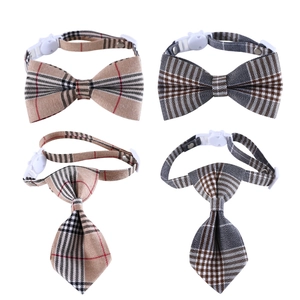 Detail showing assorted British style plaid pet bow ties and neckties with adjustable buckles