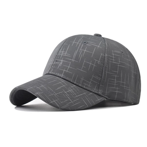 Detail view of dark grey baseball cap showing linear texture and six-panel stitching