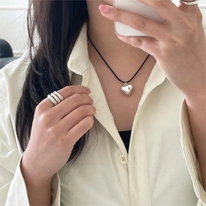 Elegant 925 sterling silver heart pendant necklace and stacked metal rings for women
