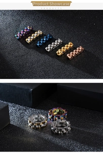 Macro detail of watch band style stainless steel rings in six metallic finishes