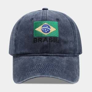 Close-up of Brazil flag and Brasil text embroidery on washed blue baseball cap