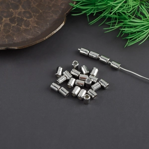 Macro shot of silver plated non-slip moon crescent spacer beads for DIY jewelry making