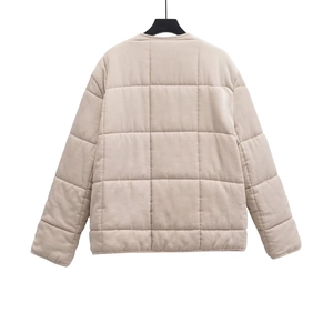 Back view of apricot quilted puffer jacket featuring large square stitching pattern