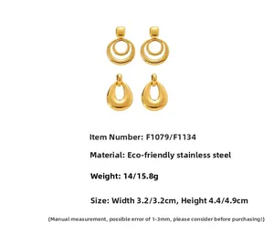 Detailed view of polished gold geometric hoop earrings with sizes and material specs
