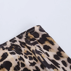 Close-up of leopard print fabric stitching and texture of the corset tube top