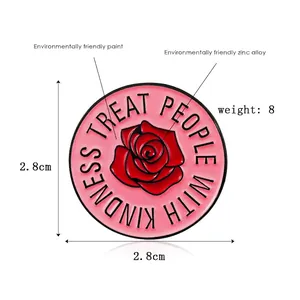 Pink enamel badge with red rose and Treat People With Kindness slogan 2.8cm diameter