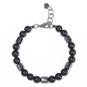 Detail of 8mm tiger eye bead bracelet with hematite accents and stainless steel clasp