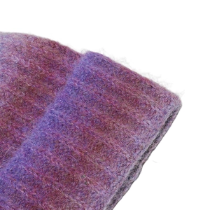 Detailed close-up showing the purple tie-dye mohair texture and thick ribbed knit pattern