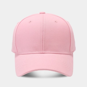 Detail of pink cotton twill baseball cap showing six-panel stitch and curved brim