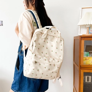 Floral print canvas backpack in cream white with pink flowers for school and travel