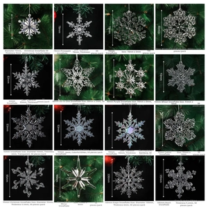 Macro view of 16 assorted clear acrylic Christmas snowflake ornaments in a grid display