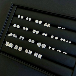 Macro view of various S925 sterling silver stud earrings with sparkling cubic zirconia