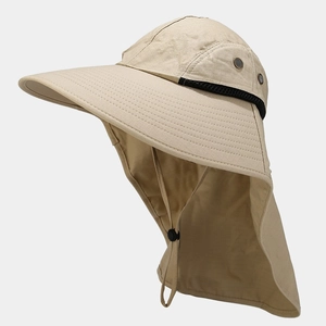Macro detail of breathable mesh grid and khaki waterproof fabric on outdoor sun hat