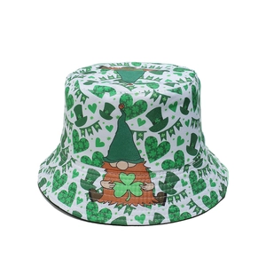 Detail of white bucket hat with green gnomes and shamrocks for St. Patrick's Day celebration