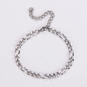 Close-up of a 5.5mm stainless steel flat curb link bracelet with an extension and round tag