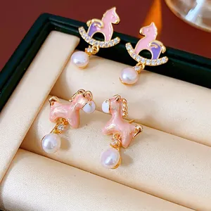 Exquisite horse-shaped pearl earrings with sparkling zircon and pink enamel accents