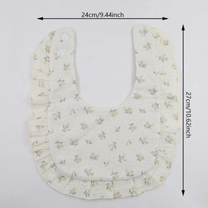 Floral cotton baby bib with ruffles and dimensions 24x27cm in white and yellow