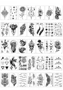 Detailed sheet of black sketch temporary tattoos featuring floral and animal motifs