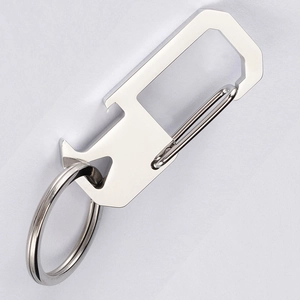 Close-up of a silver stainless steel keychain with integrated bottle opener function