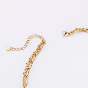 Golden double layer necklace featuring tree of life pendant in polished stainless steel