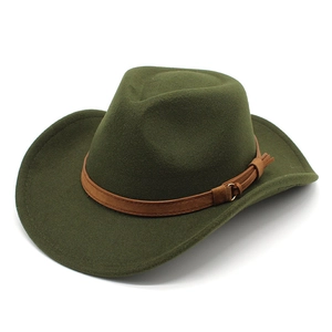 Detailed macro view of dark green fedora hat with brown leather band and metallic buckle