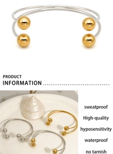 Detail showing gold and silver stainless steel ball bangles with waterproof properties