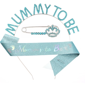 Blue Mommy To Be party set featuring rhinestone headband, crown pin and glitter sash