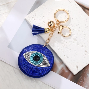 Blue Evil Eye keychain with crystal heart, gold chain and dark blue tassel pendant